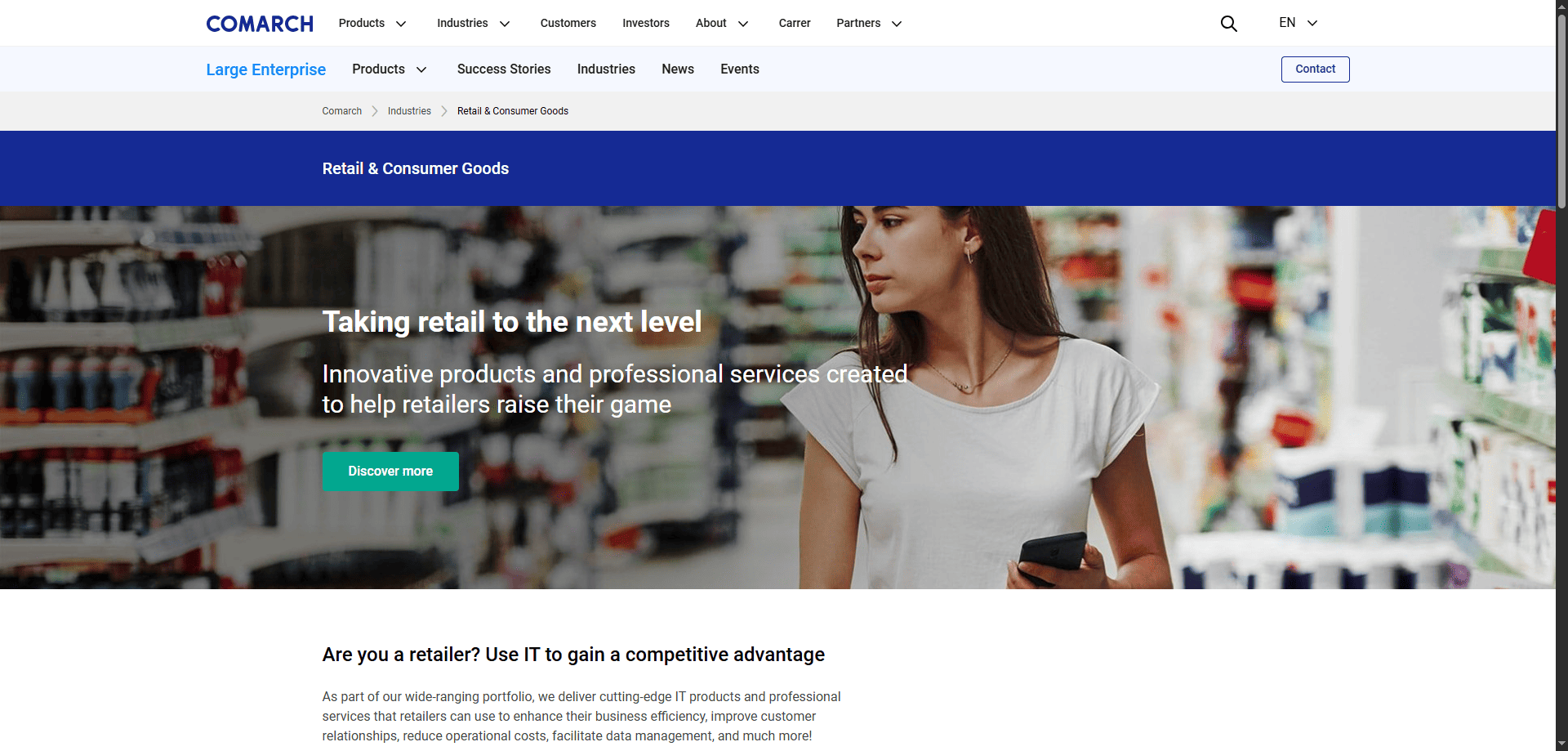 A woman shops in a supermarket, holding her phone. The COMARCH header promotes retail CRM and IT solutions with a green Discover more button.