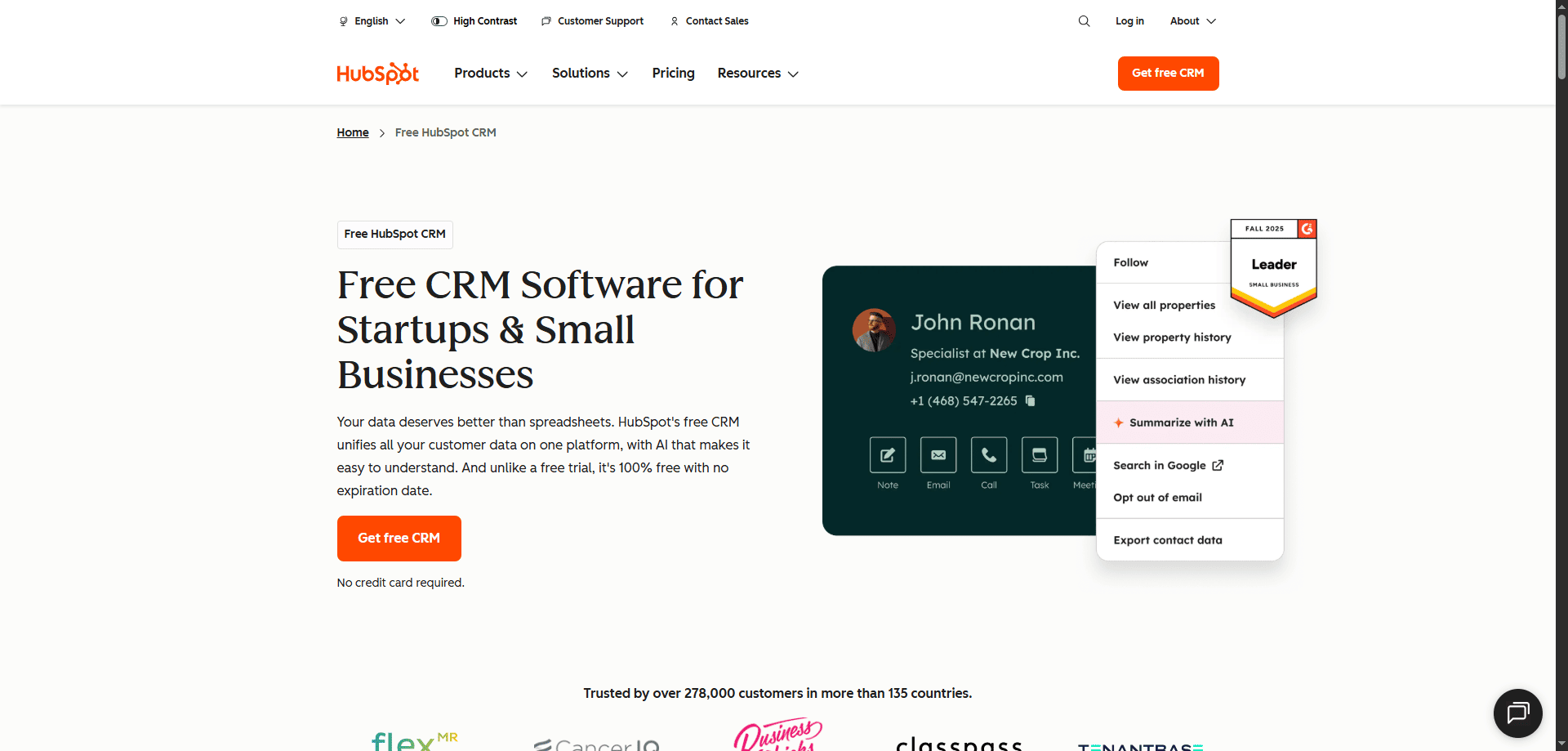 HubSpot Free CRM webpage with headline, free CRM offer for businesses, call-to-action button, navigation menus, and Leader badge.