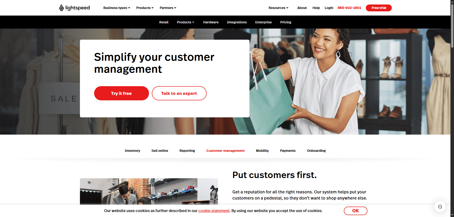 A smiling customer receives a shopping bag from a store associate under a Retail CRM banner, with Lightspeed logo top left.