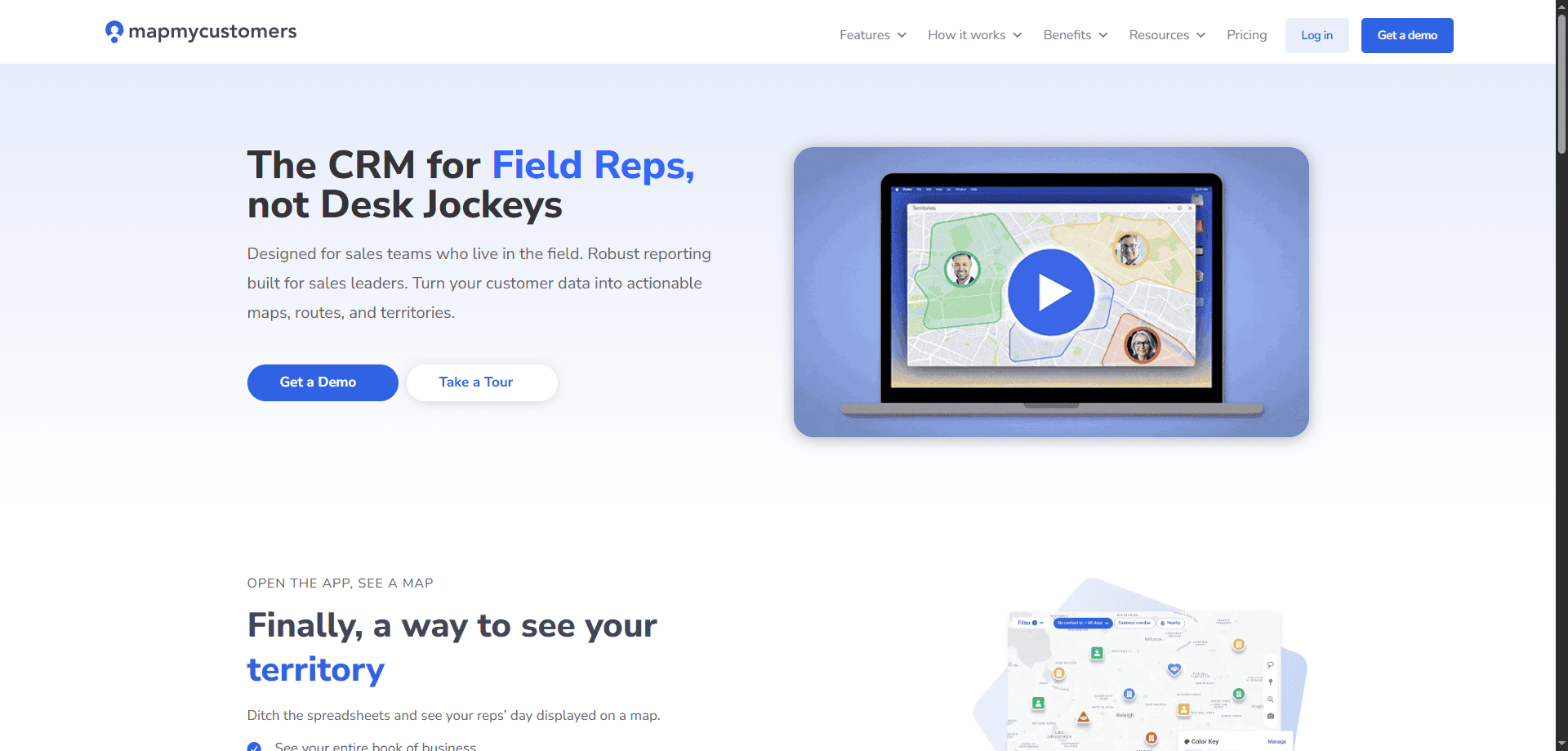 Map My Customers homepage screenshot with a CRM for field reps headline, demo and tour buttons, and a laptop on a blue background.