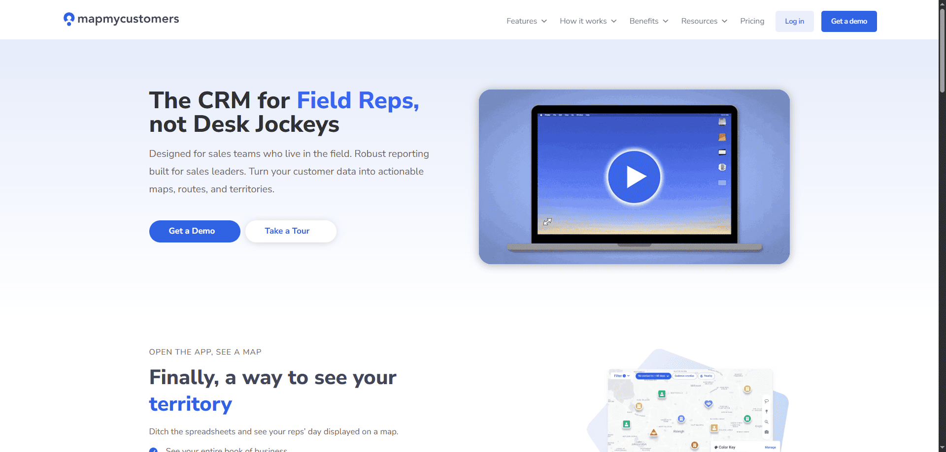 Map My Customers homepage with CRM headline for field sales reps, demo and tour buttons, laptop video, and smart algorithm territory map.