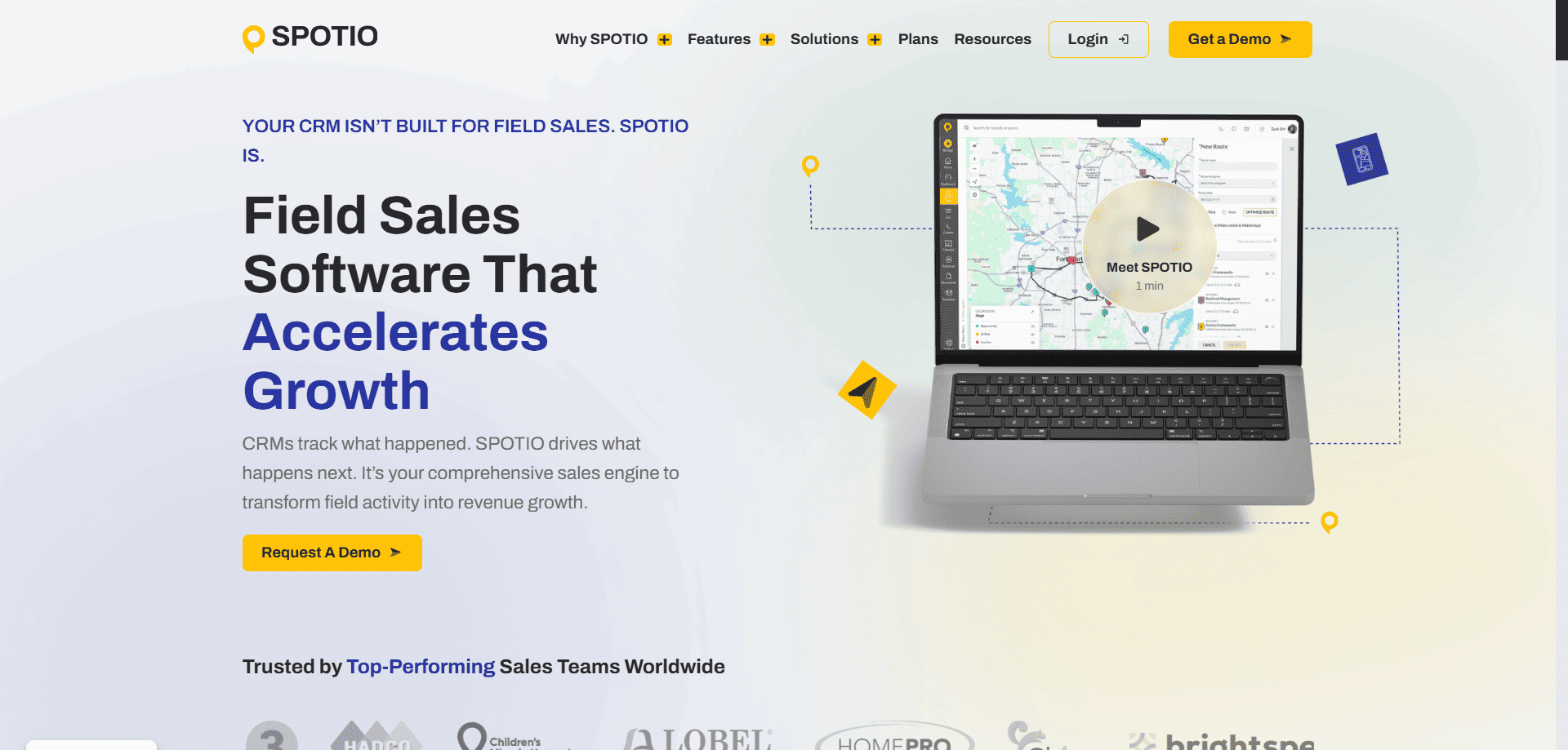 SPOTIO homepage featuring field sales software with AI route planning, a yellow "Request A Demo" button, map on laptop, and client logos.