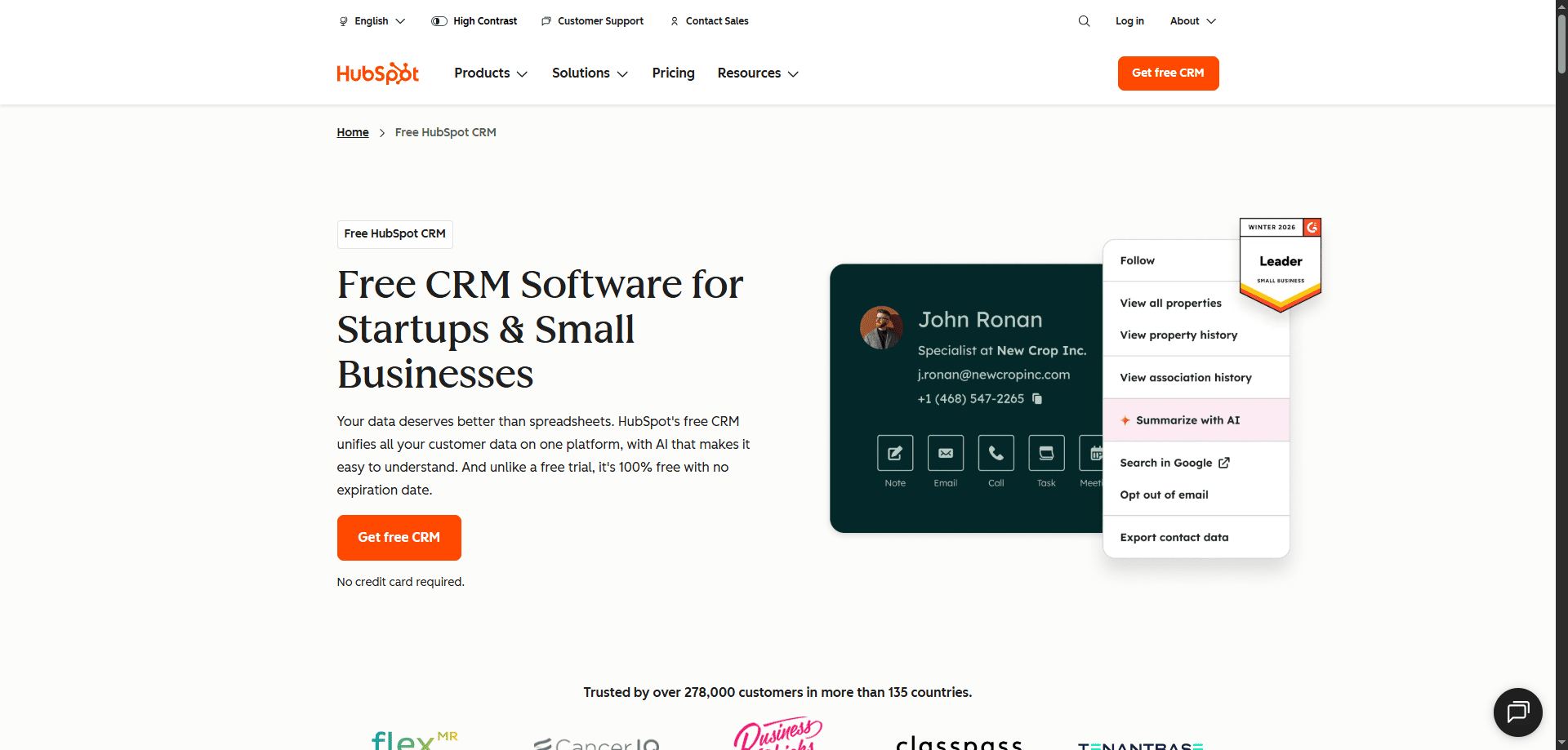 HubSpot Free CRM Software webpage showing CRM tools for startups and small businesses, with a contact card and Leader badge.