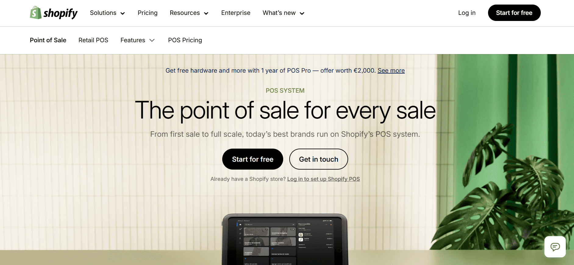 Shopify POS page with “The point of sale for every sale” headline, free start and contact options, tablet, green-beige backdrop, plant.