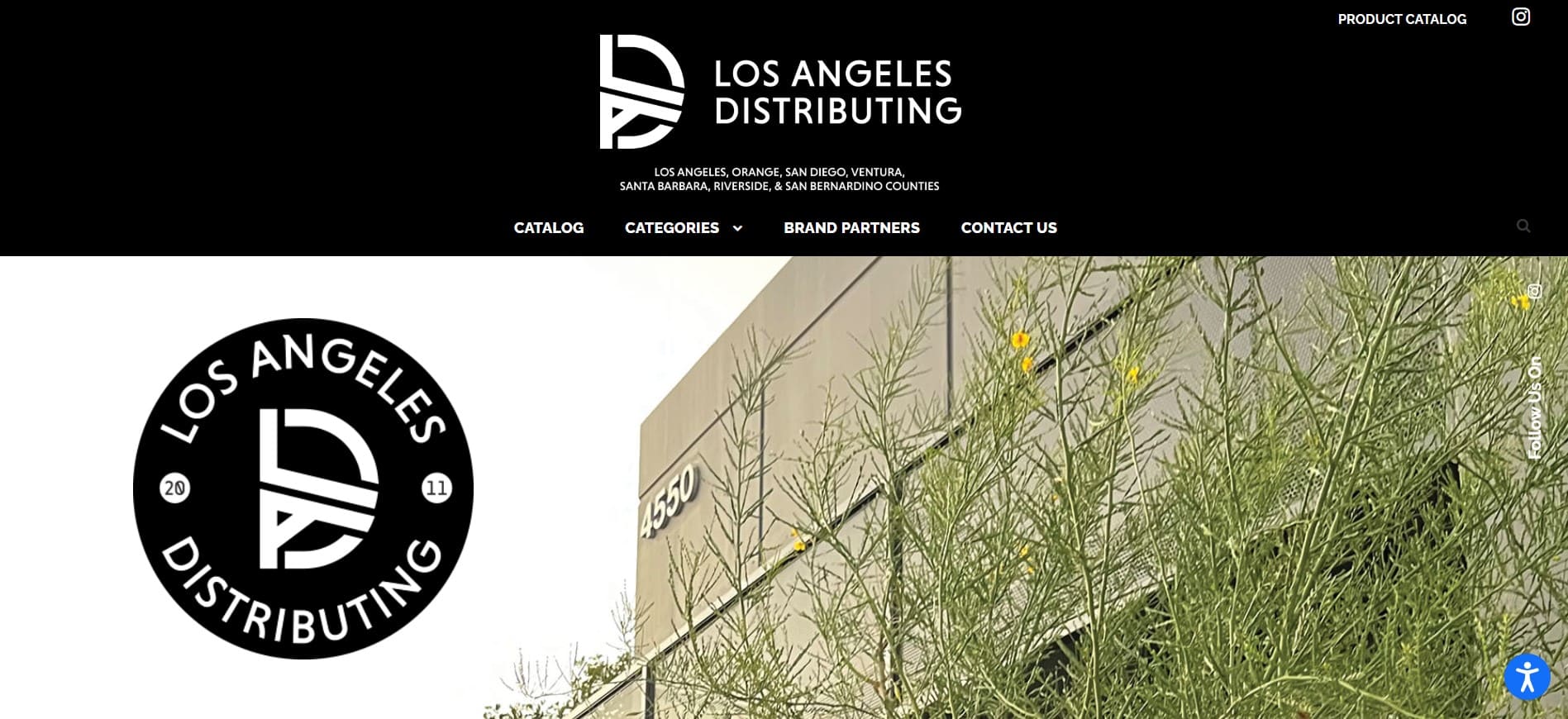 Los Angeles Distributing homepage screenshot with logo, navigation, beige building, green plants; top Direct Store Delivery for CPG Brands.