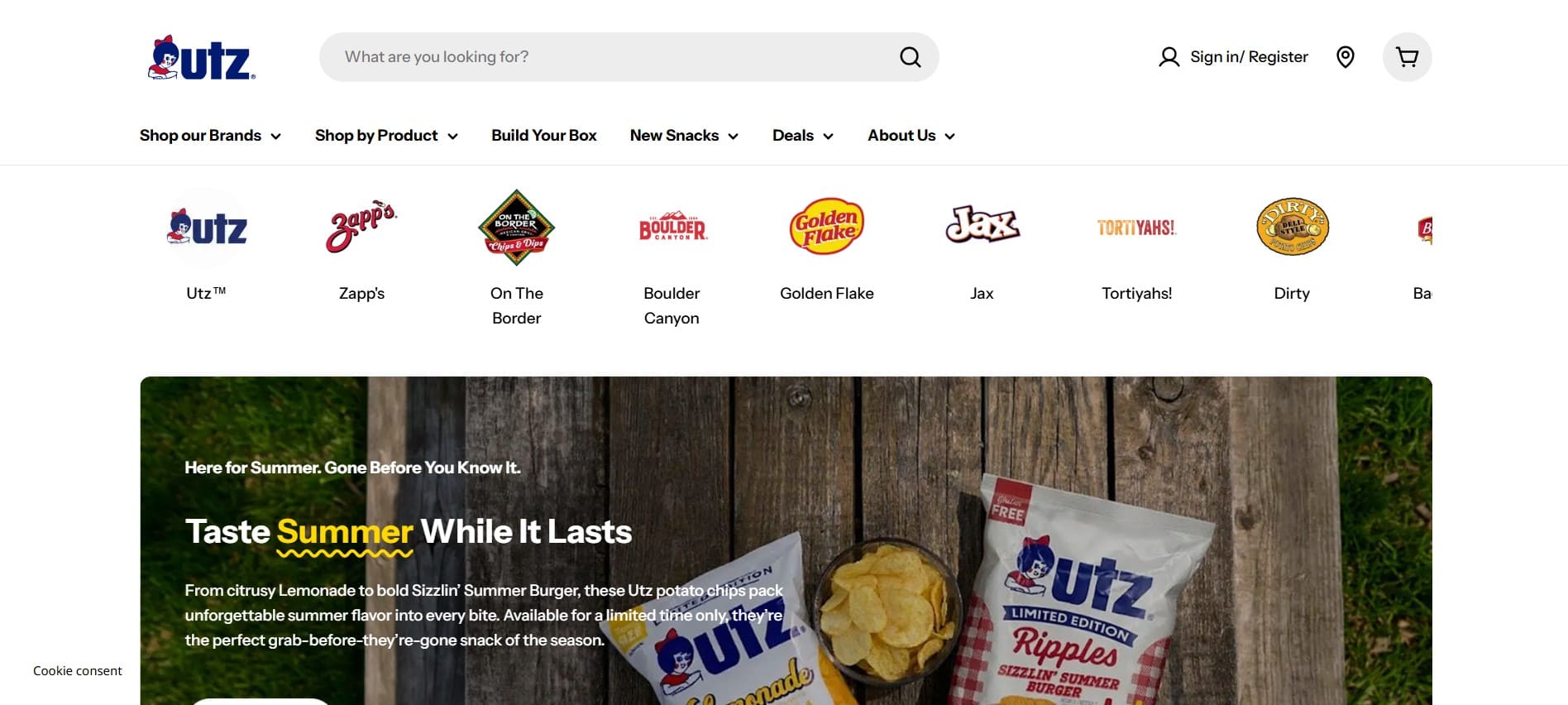 Utz Snacks homepage with navigation, CPG brand logos, and a summer banner showing Utz chips on wood table, highlighting 2026 delivery.